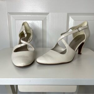 Classic White Heels with Vintage-Inspired Design